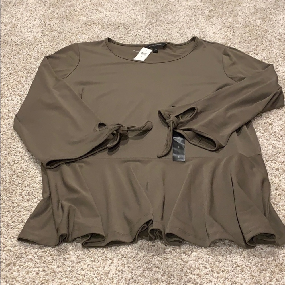 3/4 sleeve top with peplum detail